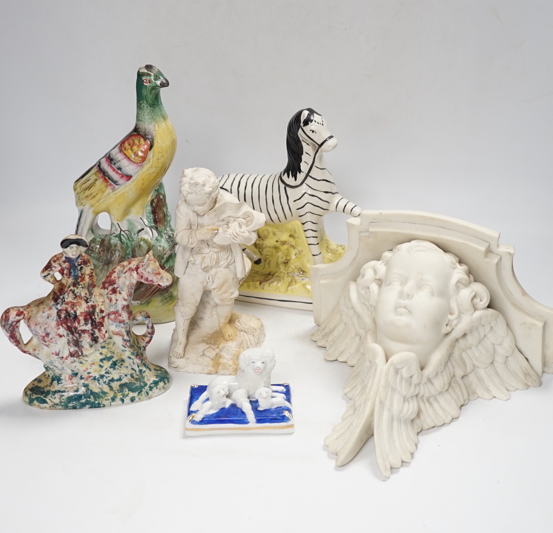 A Staffordshire spongeware rider on horseback, a Staffordshire pheasant, and three other items, pheasant 26cm